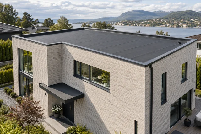 Illustrert hus med asfalttakbelegg.