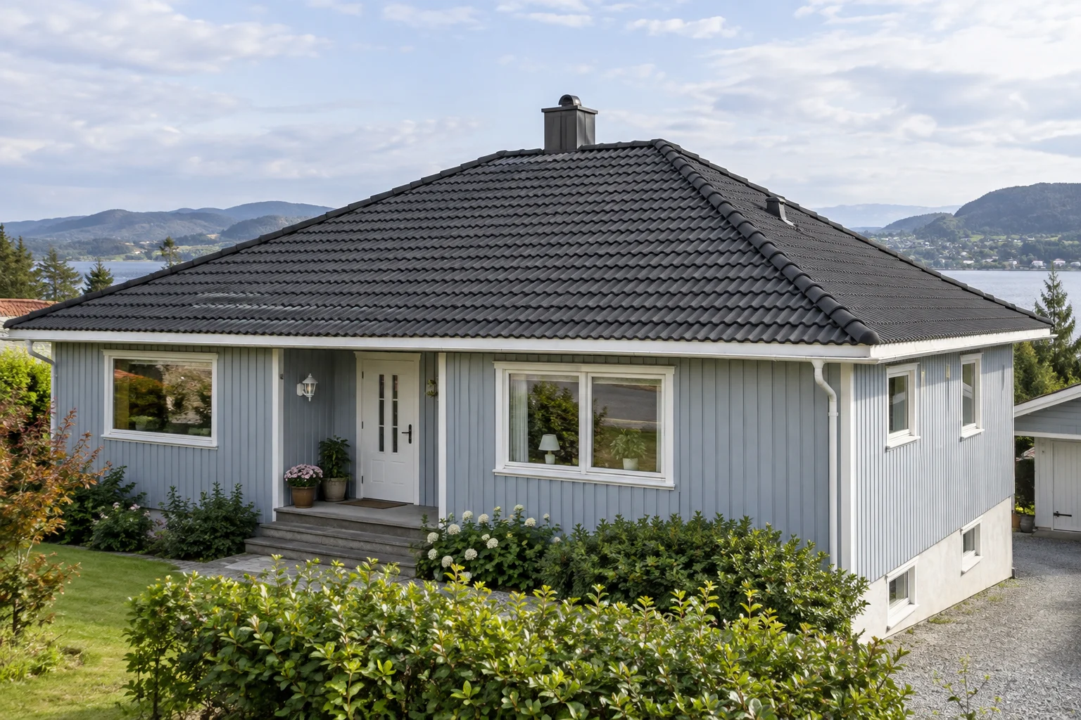 Illustrert hus med betongtakstein.